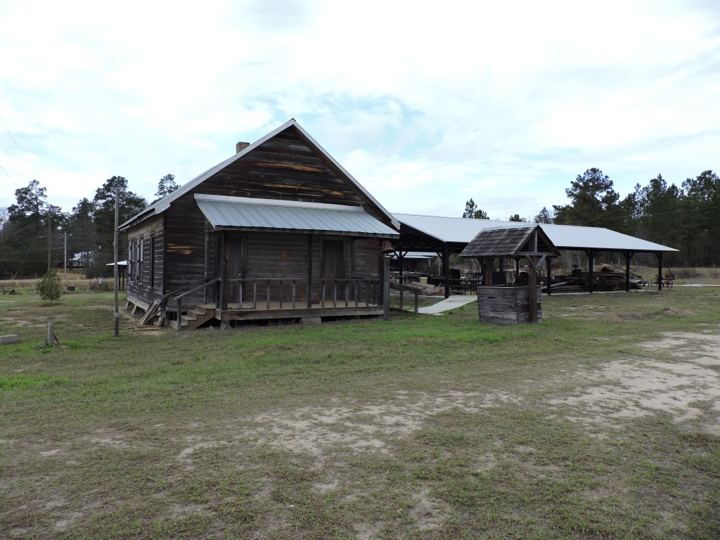 Relocated 1890 Coleman Academy and farm structures at Emanuel County's Farm & Home Museum.