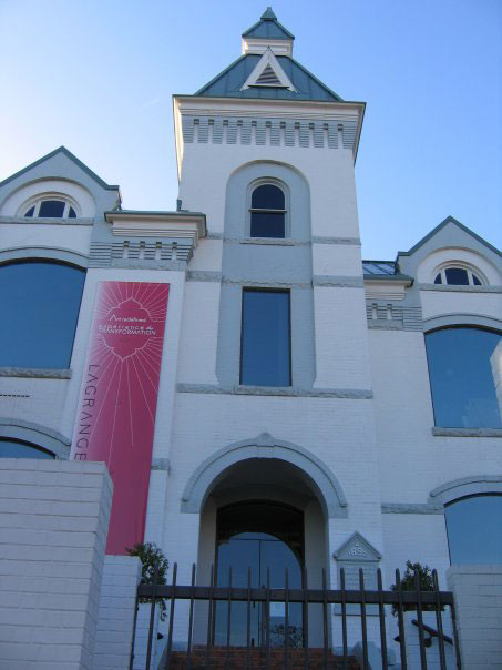 White-brick 1892 former jail that houses the LaGrange Art Museum.