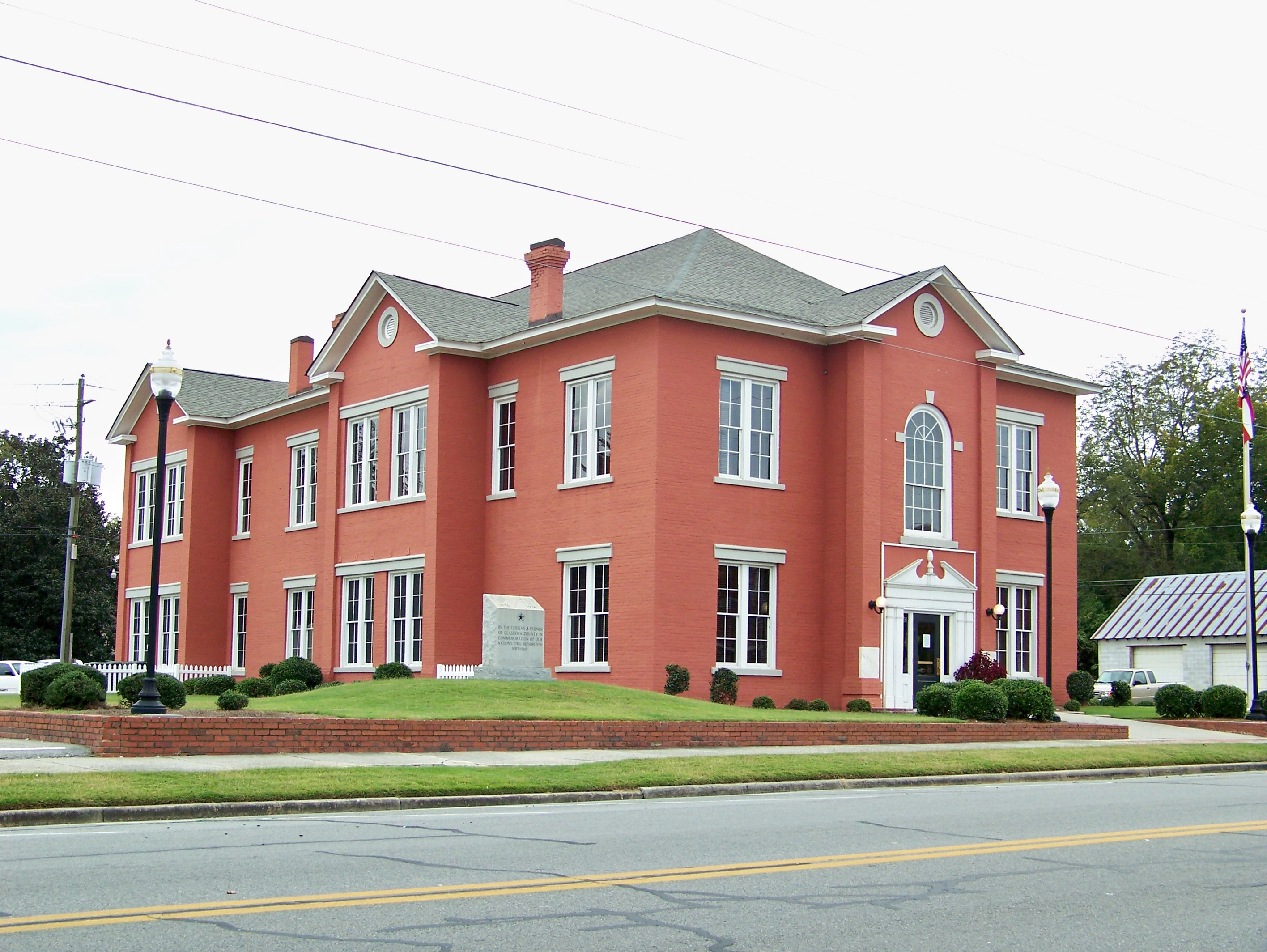 Red-brick Glascock County Courthouse beside Main Street in Gibson.