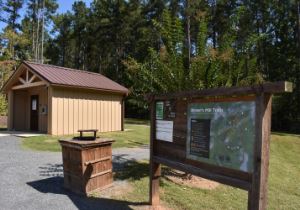 Brown's Mill Battlefield visitor kiosk, trail map and small park building in Newnan.