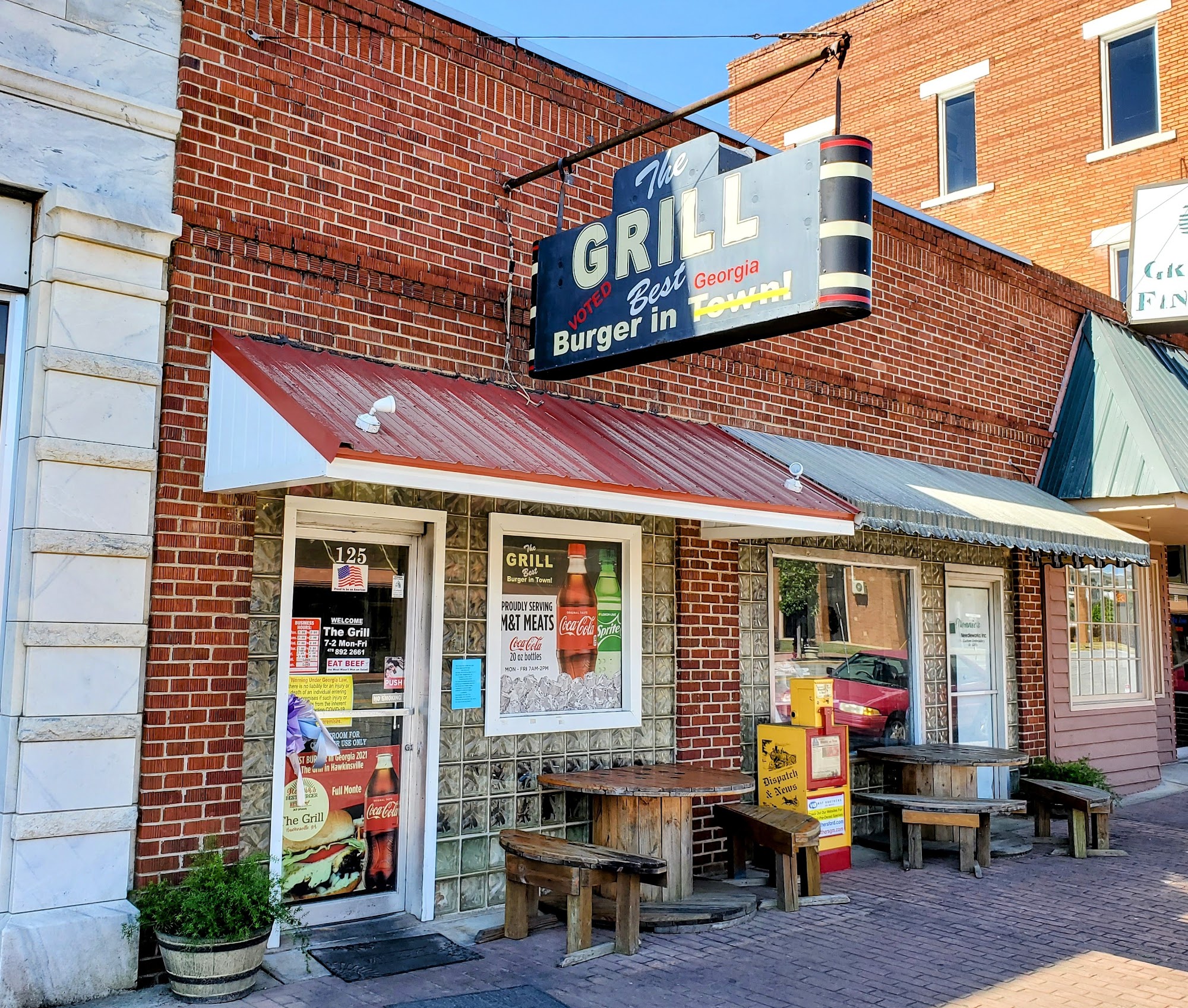 The Grill's signed brick storefront on Commerce Street in Hawkinsville.