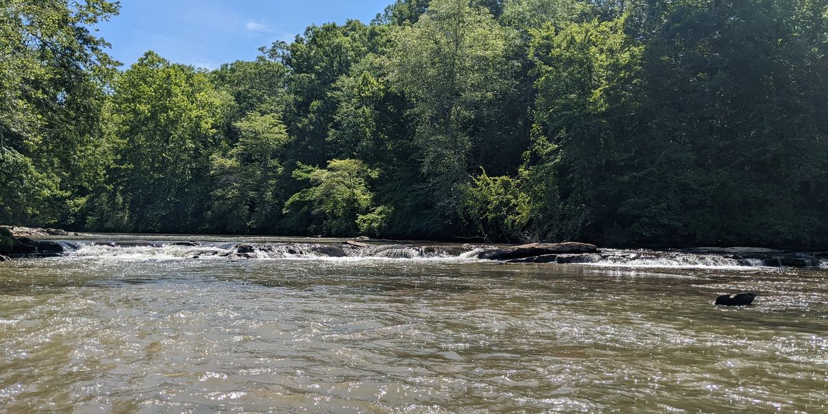 Low rocky shoals across the Chattahoochee River at Bush Head Shoals.
