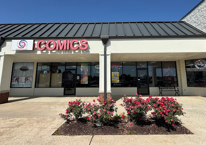 Heroes and Villains' signed comic-shop storefront on Russell Parkway.