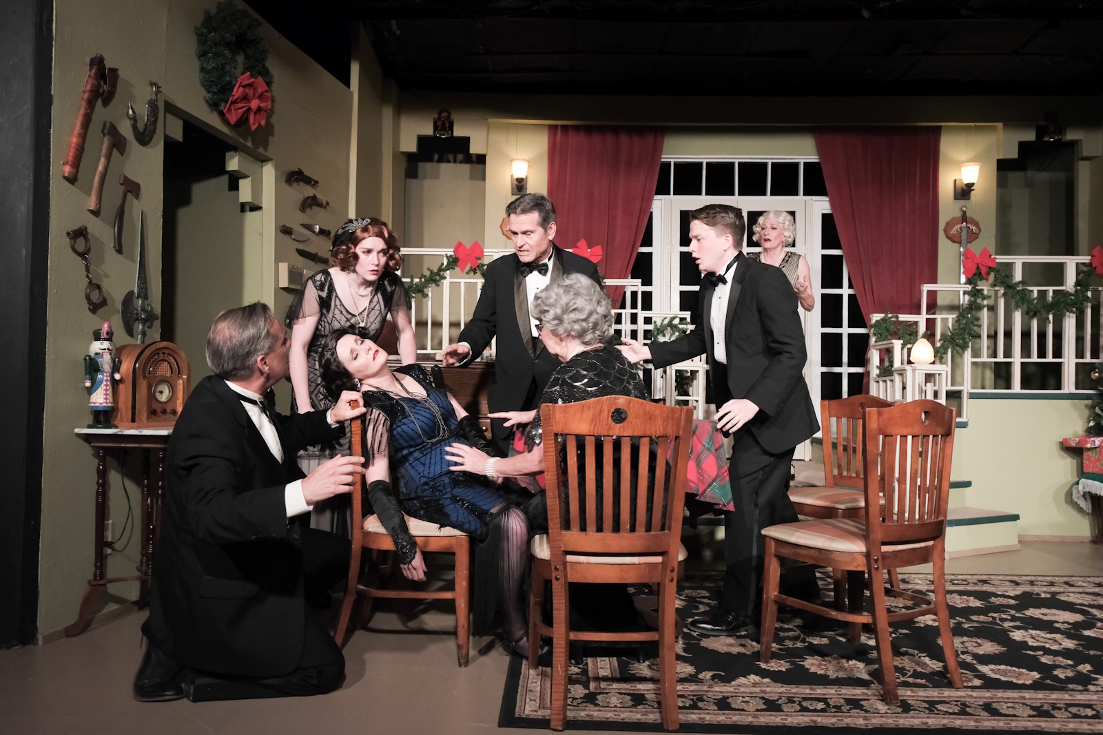 Actors performing in an archival Main Street Players production of The Game's A Foot.