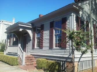 Porch and street-facing exterior of Burke County Museum in downtown Waynesboro.