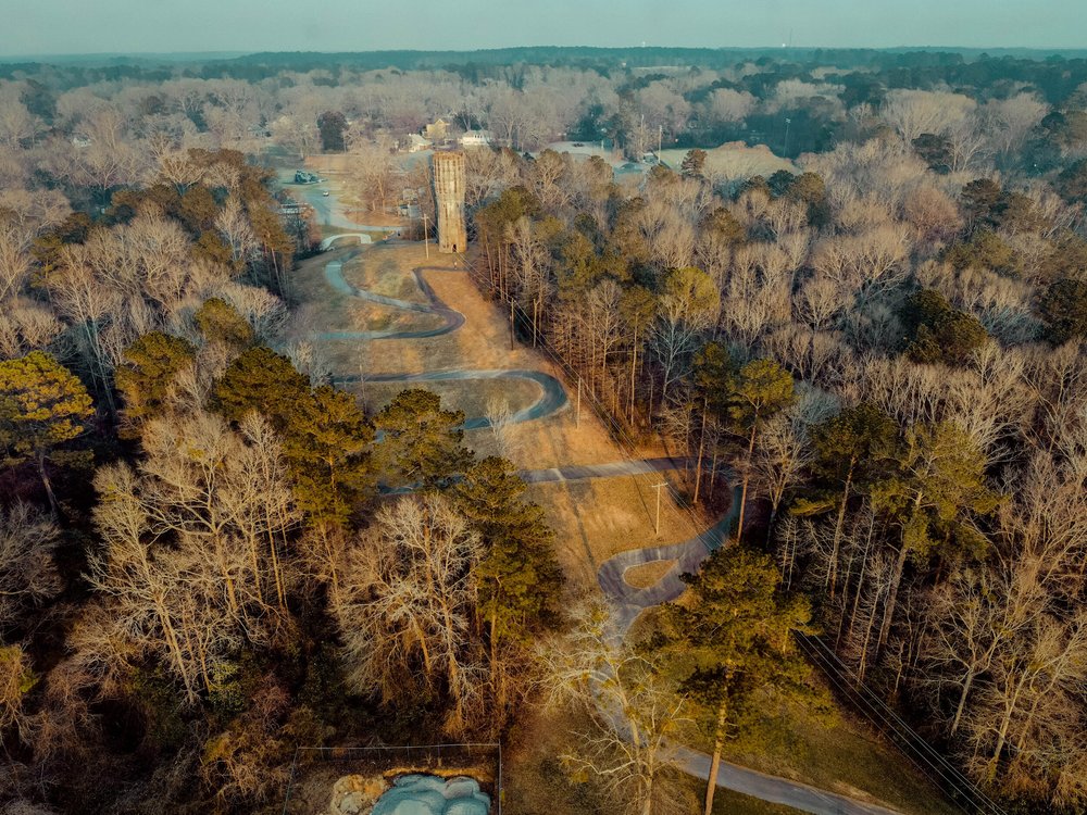 Aerial view of Tower Trail's paved switchbacks and historic concrete water tower.