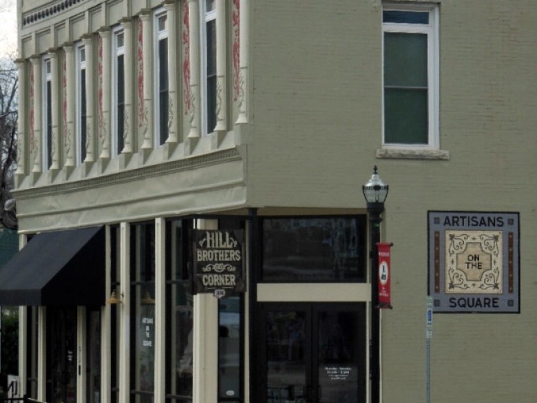 Artisans on the Square entrance in the historic Hill Brothers Corner building.