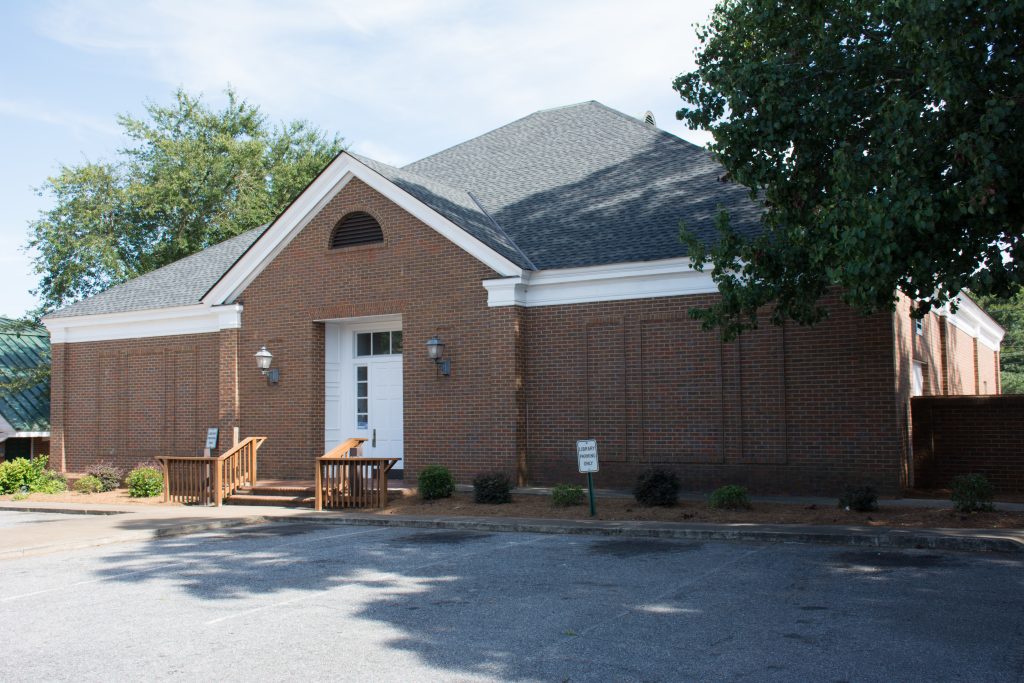 The brick Marion County Public Library building, entrance and accessibility ramp in Buena Vista.