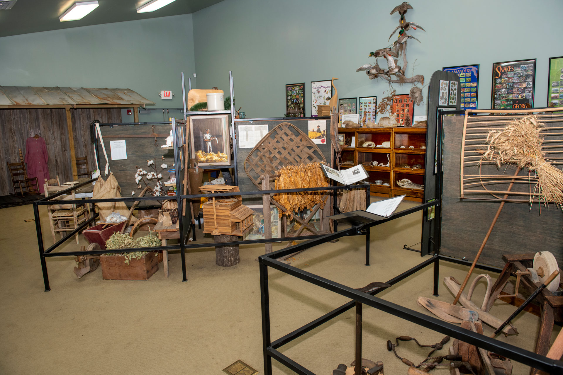Agricultural, timber-rafting and river-ecology exhibits inside the Towns Bluff Heritage Center.