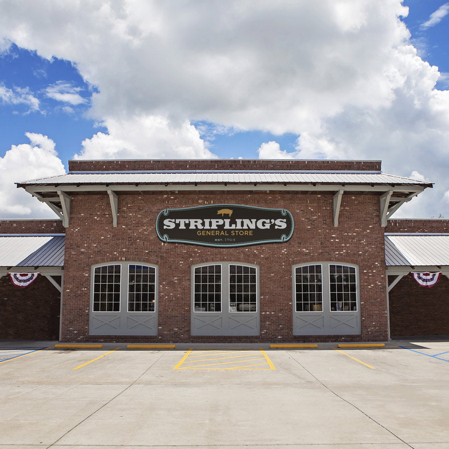 The brick facade and large Stripling's General Store sign at the Cordele Highway 300 flagship.