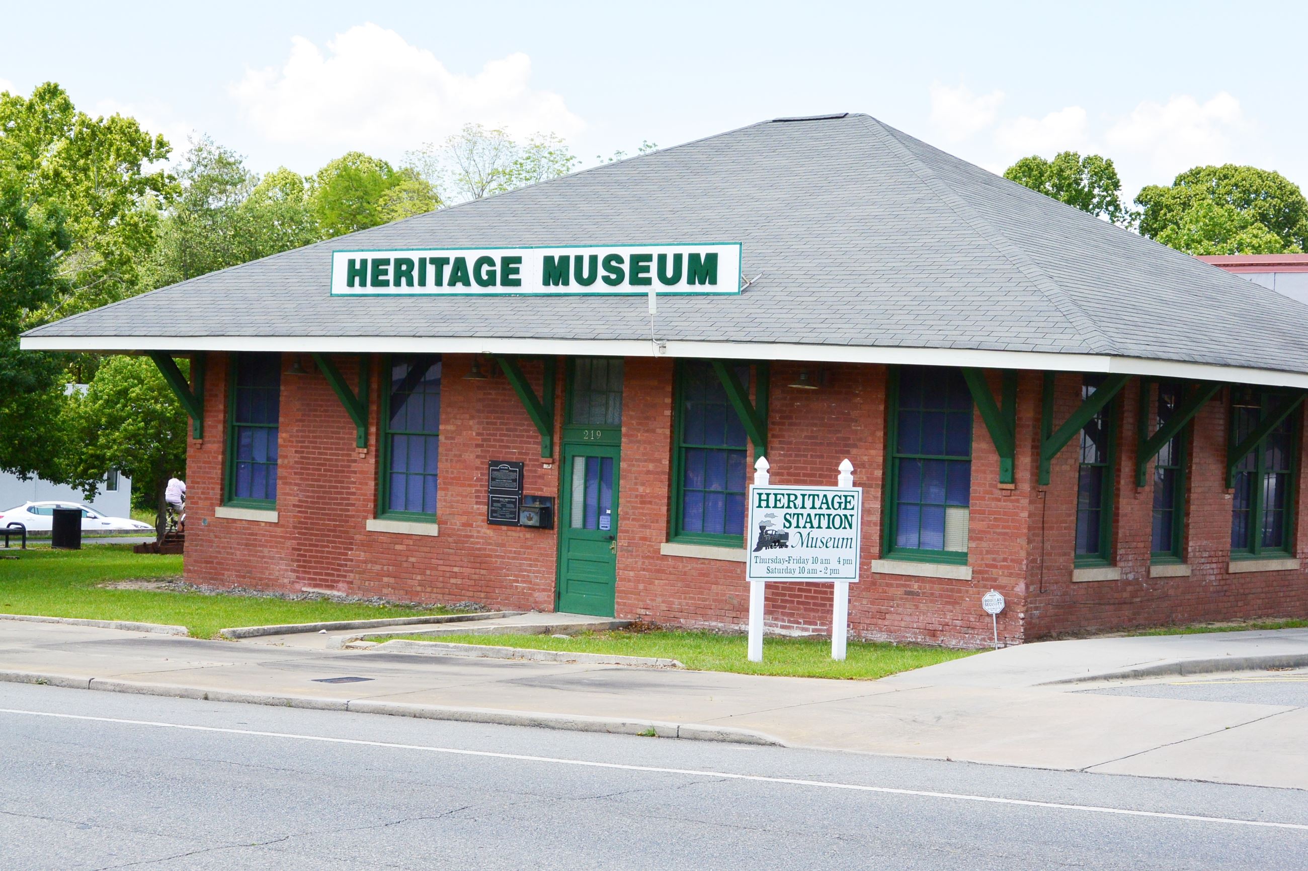 The red-brick Heritage Station Museum in Douglas, with its depot form and large museum lettering.