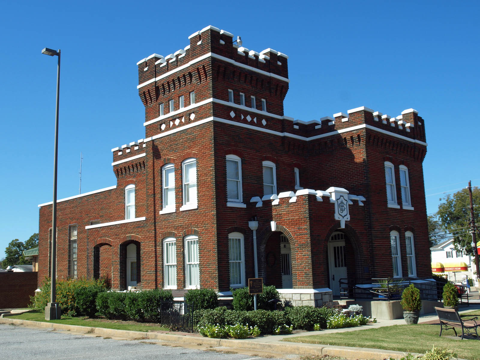 The distinctive two-story brick former Barrow County jail that houses the county museum.