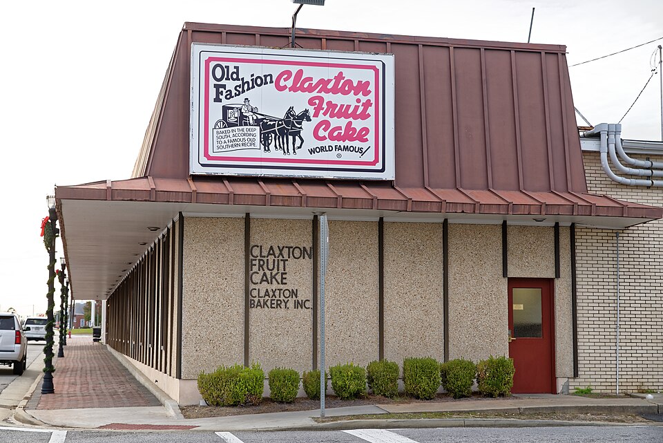 The Claxton Bakery exterior and fruitcake sign on West Main Street in Claxton.