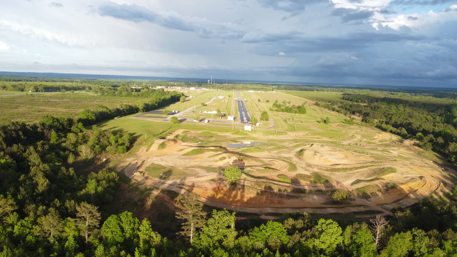 Aerial view of the drag strip and dirt courses at Silver Dollar Motorsports Park in Reynolds.
