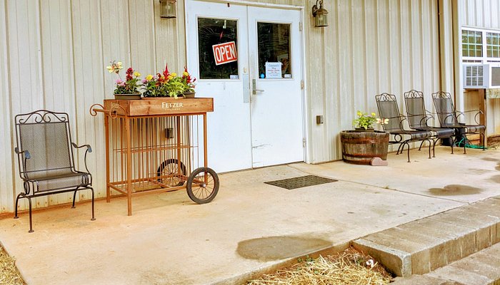 Front porch, flowers and entrance of Courson’s Winery near Sparta.