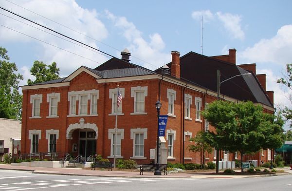 Historic brick exterior of Hawkinsville Opera House viewed from the street