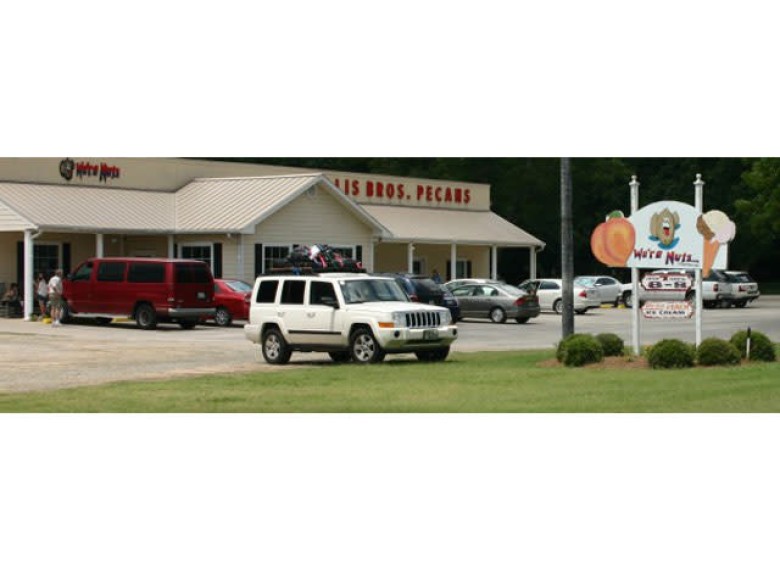 Ellis Brothers Pecans retail store and visible We’re Nuts store sign